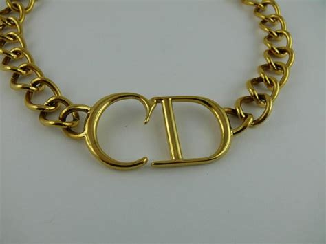 christian dior necklace gold cd|dior letters necklace value.